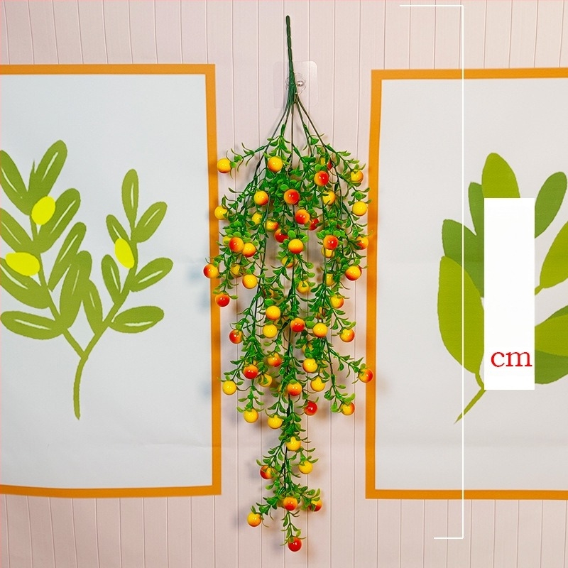 Liană artificială de perete cu fructe roșii, plante verzi decorative pentru living