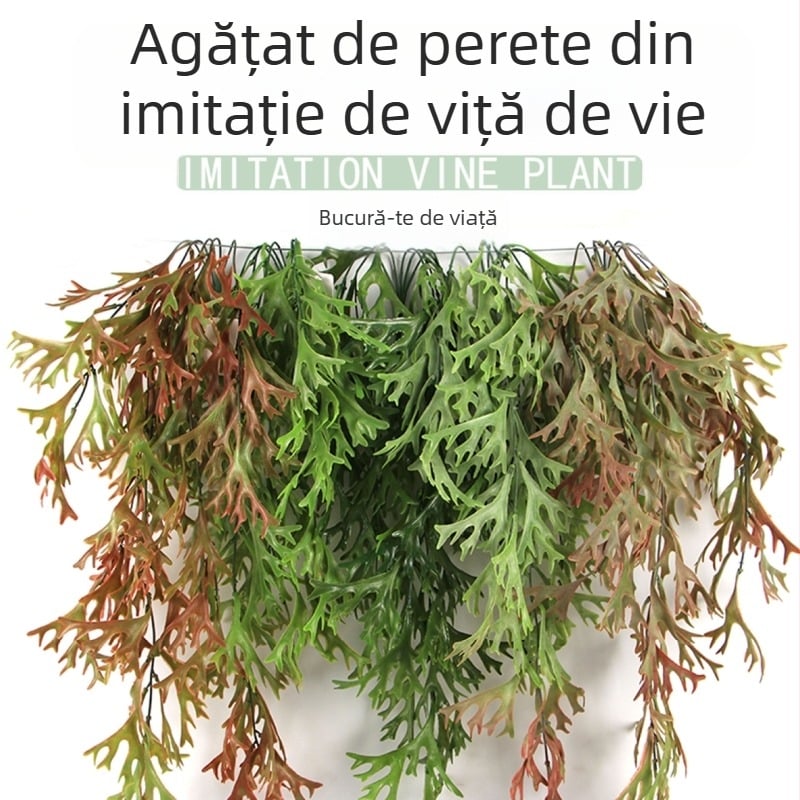 Decor de perete din plante artificiale cu frunze în formă de coarne de cerb, ferigi și accente verzi din ratan