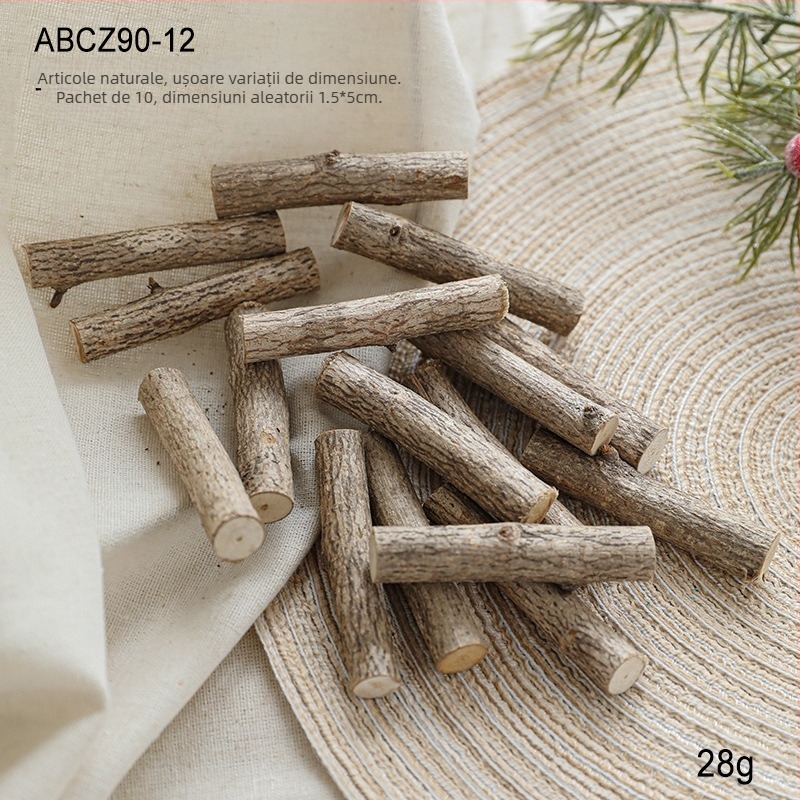 Accesorii de decor pentru scenă de Crăciun: conuri de pin naturale, bușteni din lemn, fructe uscate, flori uscate și accesorii decor pentru atmosferă