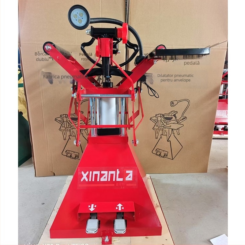 Extensor pneumatic pentru anvelope, acționat prin pedala — unealtă pentru demontarea și montarea anvelopelor