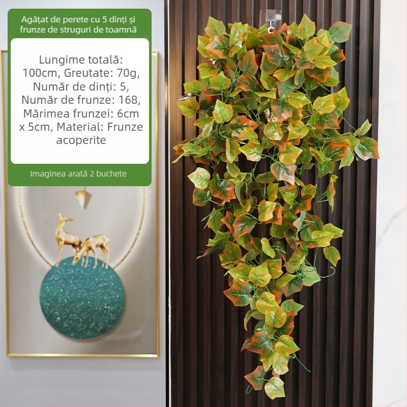 Plantă artificială verde cu frunză de arțar cu cinci loburi, agățată pe perete cu detalii din ratan — decor pentru nuntă și casă