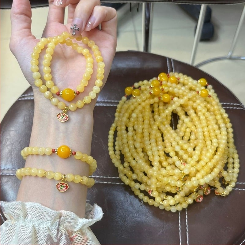Brățară cu mai multe cercuri din jad și cuarț, pandantiv picătură de ulei, agat galben miere și pandantiv cu pește aur și lotus