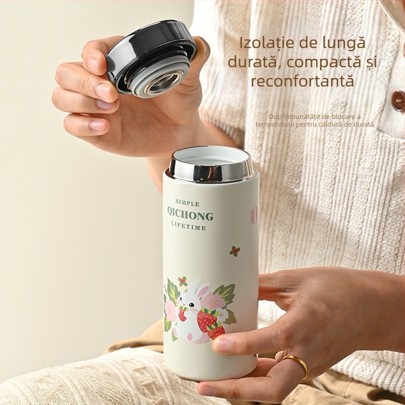 Ceașă izolată compactă, minimalistă, cu interior ceramic și carcasă din oțel inoxidabil 304, compactă și portabilă.