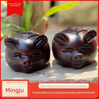 Figurină din lemn de abanos: purcel binecuvântat