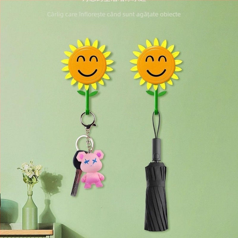 Cuier cu floare de floarea-soarelui, retractabil, autoadeziv, fără găuri, pentru casă, design zâmbitor, 1,5 kg